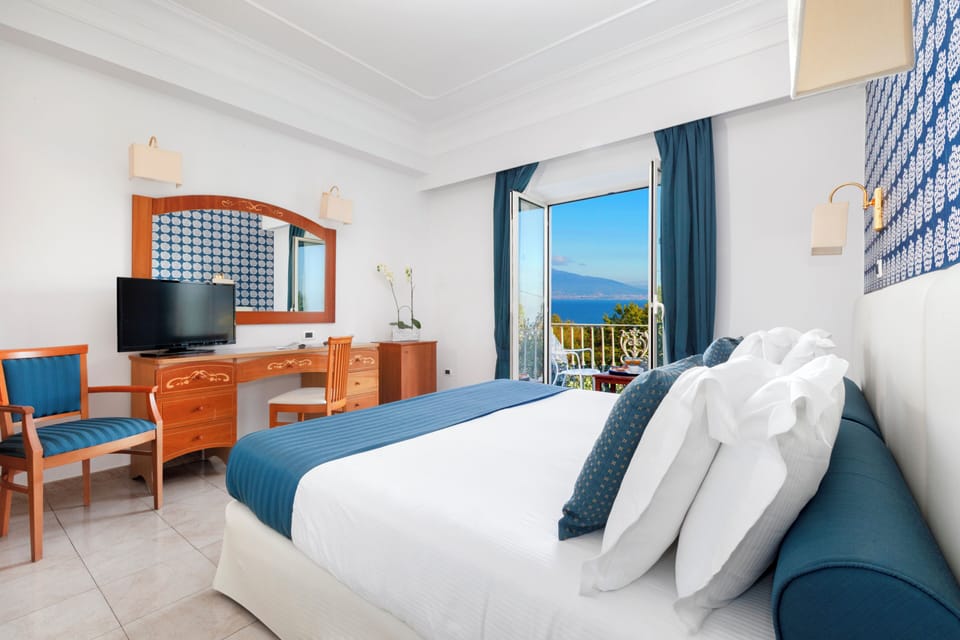 Classic Room, Balcony, Sea View | Hypo-allergenic bedding, down comforters, minibar, in-room safe