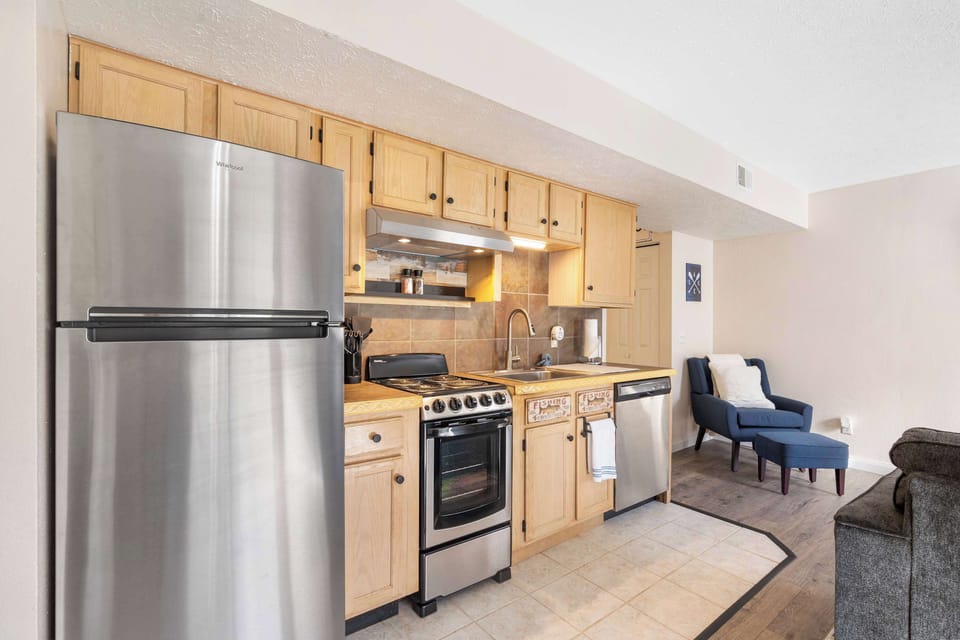 Condo, 1 King Bed with Sofa bed, Patio, Garden View (The Nautical Nook) | Private kitchen | Coffee/tea maker