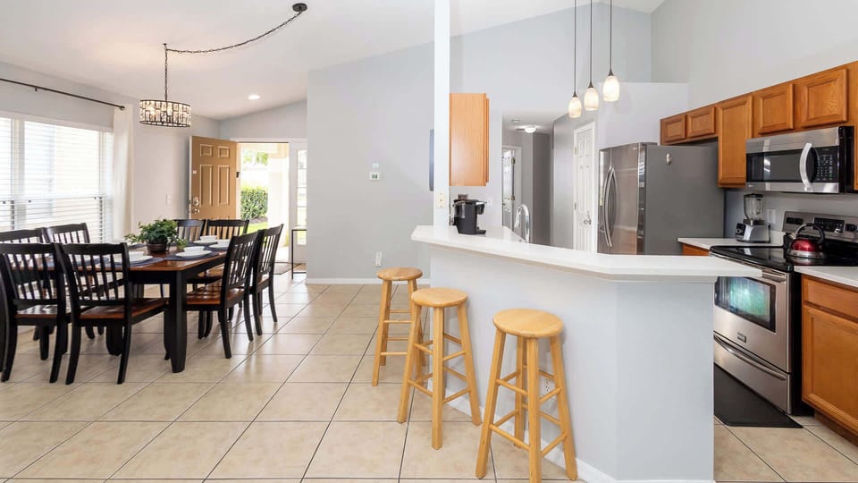 House, Multiple Beds, Pool Access, Pool View (Emerald Island Happy Place) | Private kitchen | Fridge, microwave, oven, stovetop