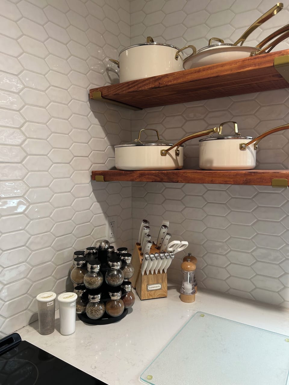 Spice rack, knife block and plenty of new pots and pans.