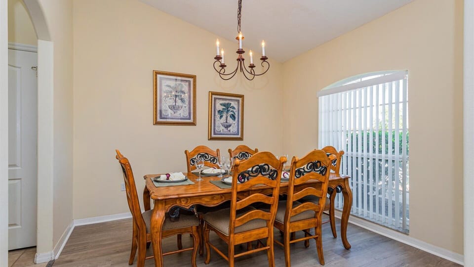 Elegant dining room with seating for eight, perfect for family meals.