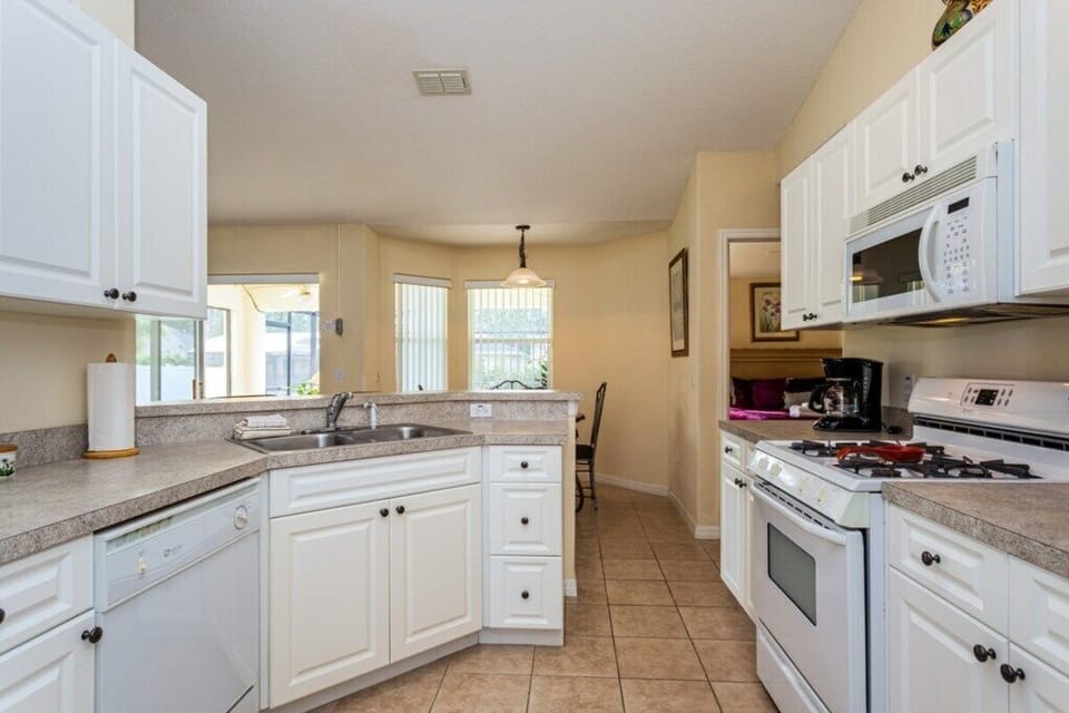 Bright kitchen with ample counter space and natural light.