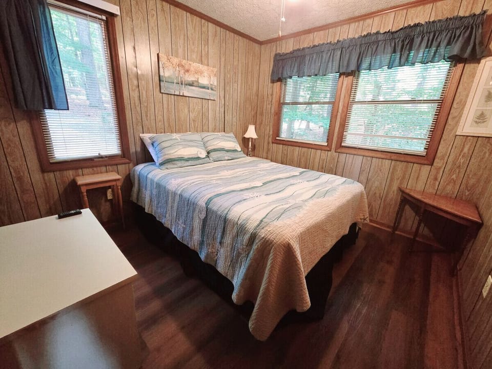 Cozy primary bedroom with efficient use of space