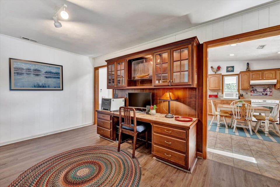 The home office offers a quiet workspace with a comfortable chair and fast internet.