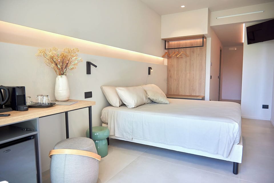 Standard Room, Balcony, Partial Sea View | Premium bedding, down comforters, memory foam beds, free minibar items