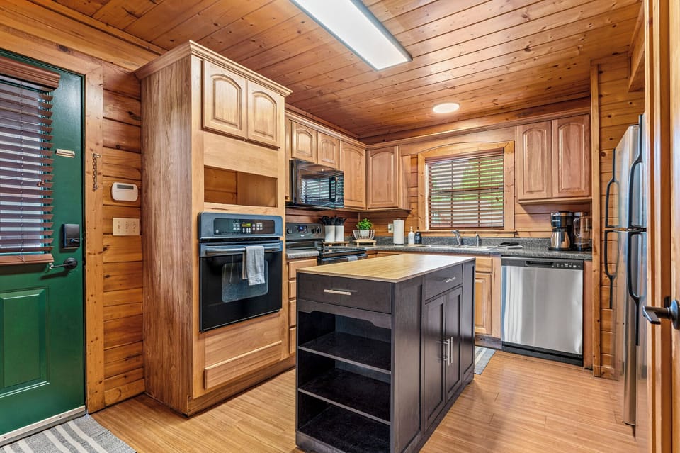 Kitchen has Removable Island to Help with Meal Prep
