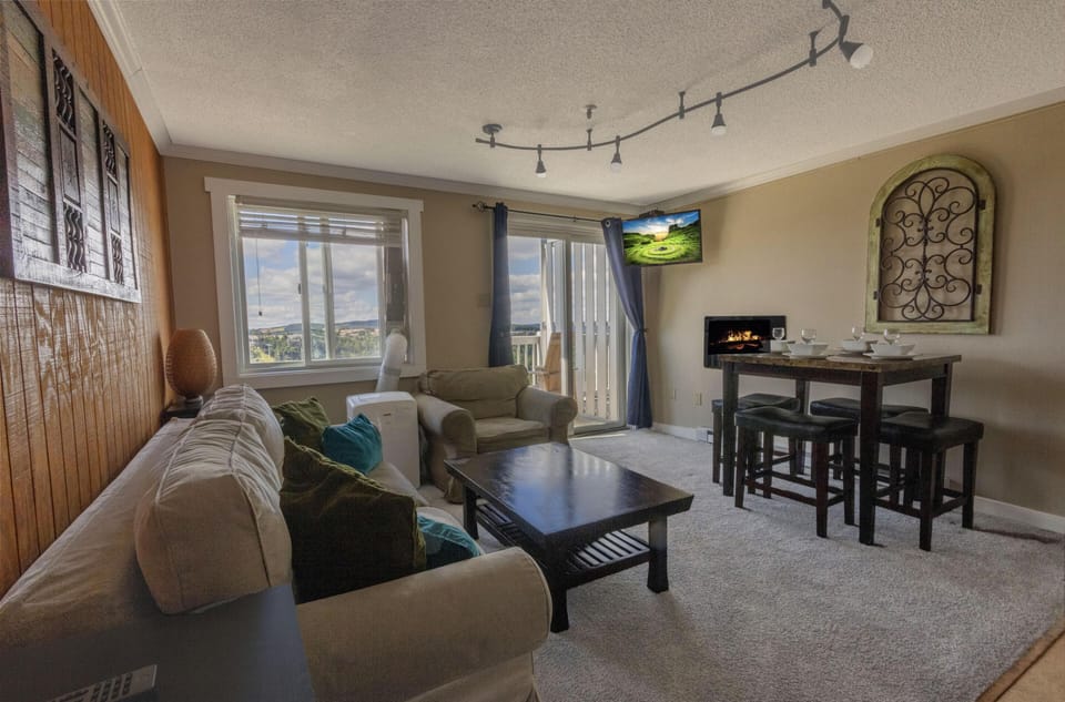 Kick back and relax in the living room, your comfortable haven after a day of mountain fun.