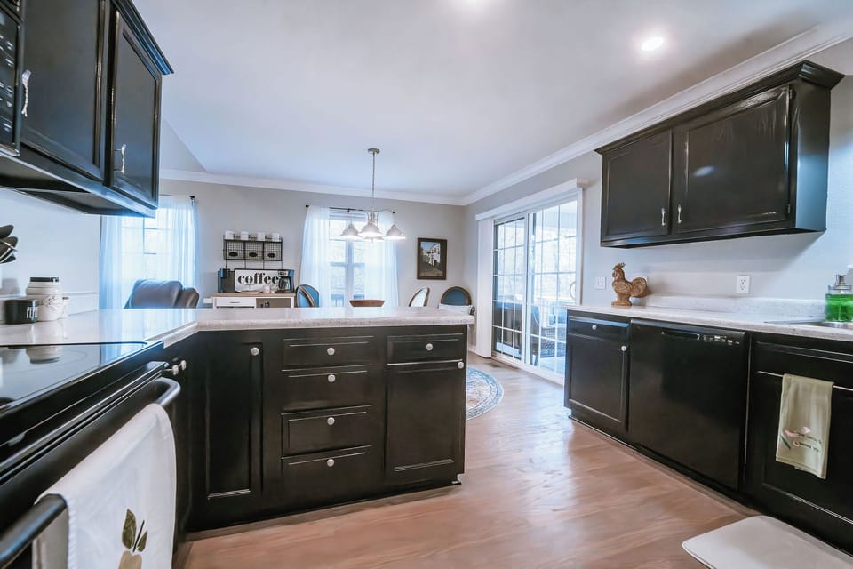 The kitchen is stocked with dishware, cookware, and supplies for your stay.