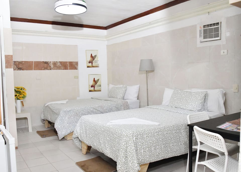 Standard Twin Room, Garden View | In-room safe, individually decorated, individually furnished