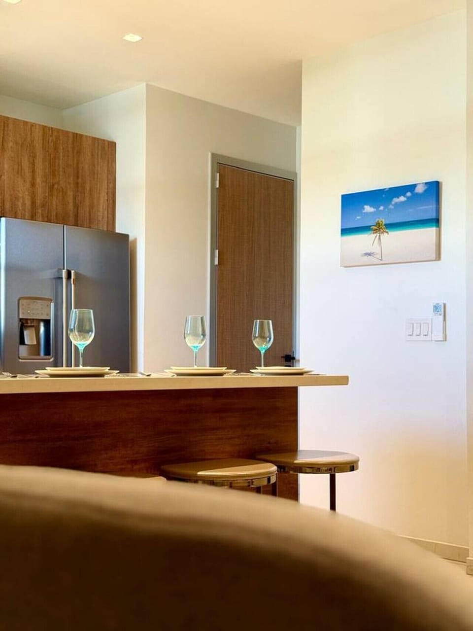 A cozy kitchen nook with bar seating—great for casual meals, coffee breaks, or a glass of wine at the end of the day.