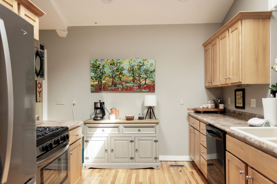 Naturally lit cottage kitchen in downtown New Buffalo