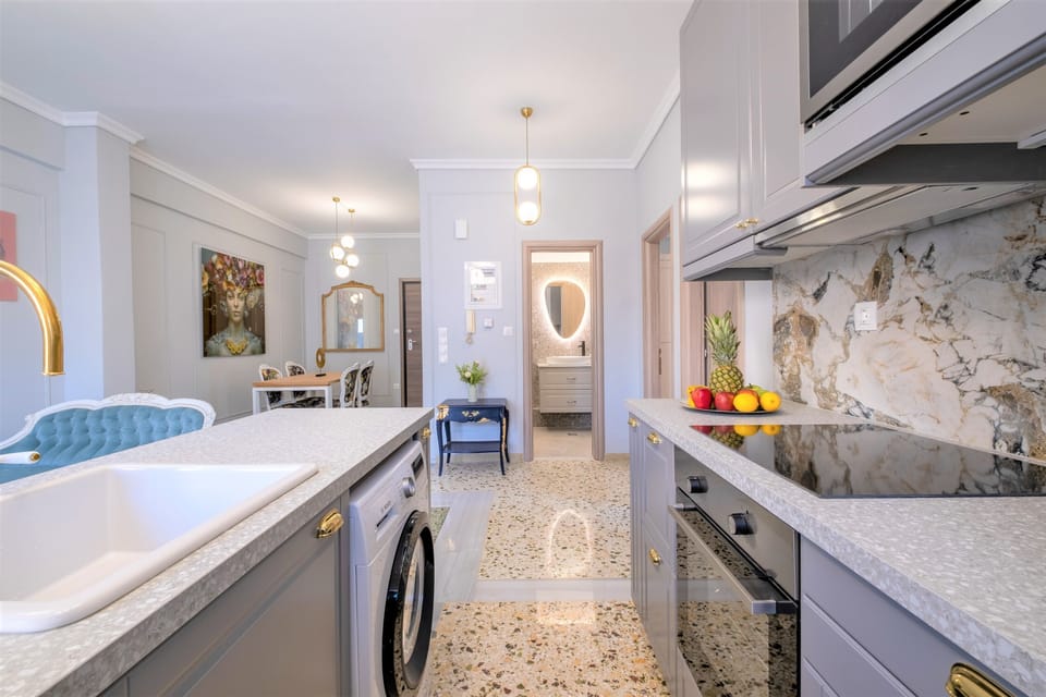 Design Apartment, 2 Bedrooms | Private kitchen | Full-size fridge, oven, stovetop, dishwasher