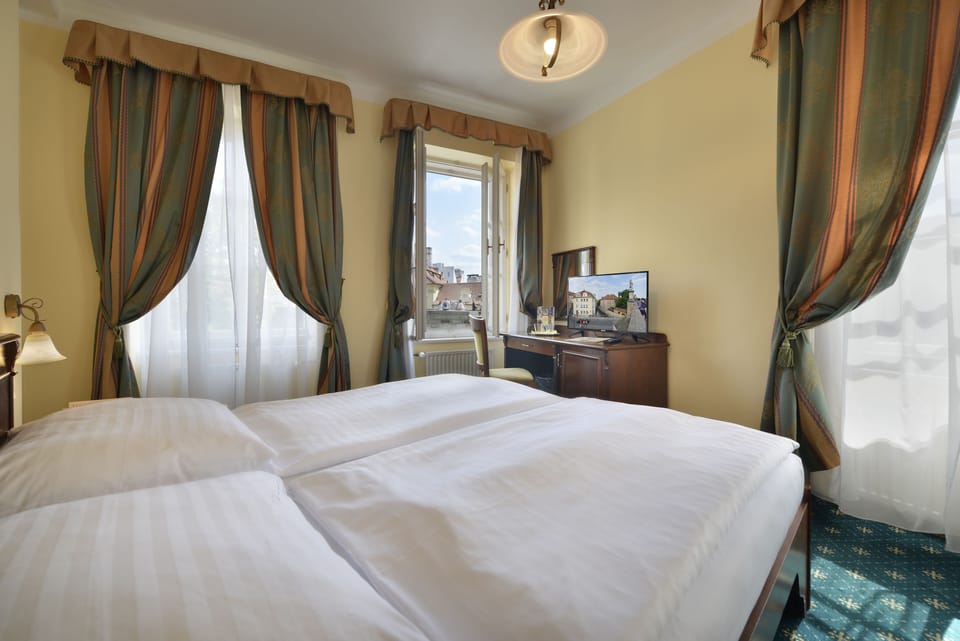 Standard Double or Twin Room | In-room safe, desk, iron/ironing board, free cribs/infant beds