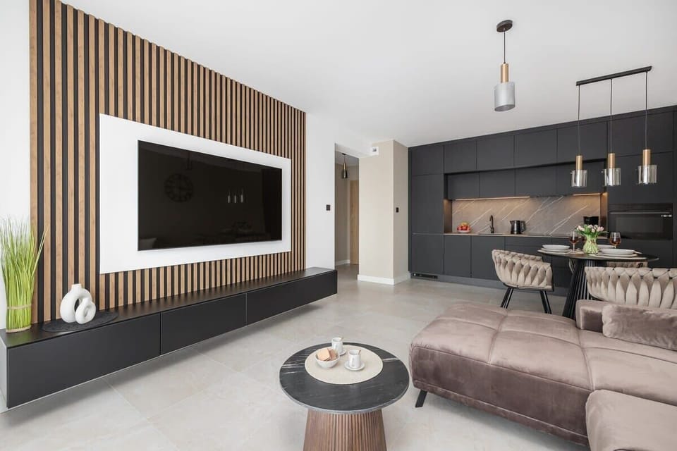Enjoy your favorite shows on the flat-screen television in the elegant living area.