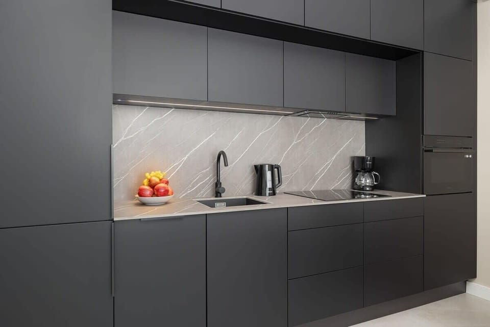 The fully equipped kitchenette includes everything you need for a home-cooked meal.