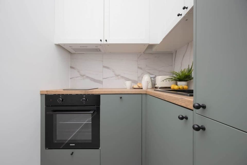 Cook and dine in style with the modern kitchenette and dining area.