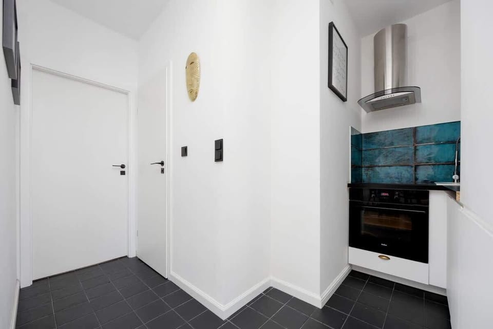 The fully equipped kitchenette includes everything you need for a home-cooked meal.