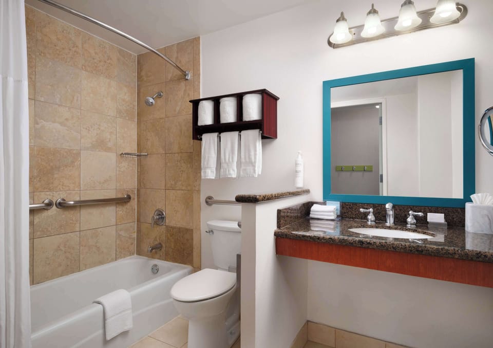 Eco-friendly toiletries, hair dryer, towels