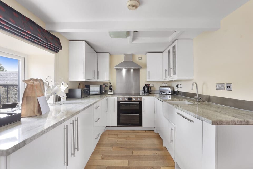 Galley kitchen with integrated appliances