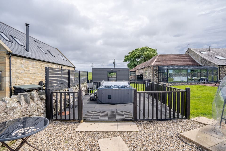 Shared hot tub within the Dukesfield courtyard and garden area.
