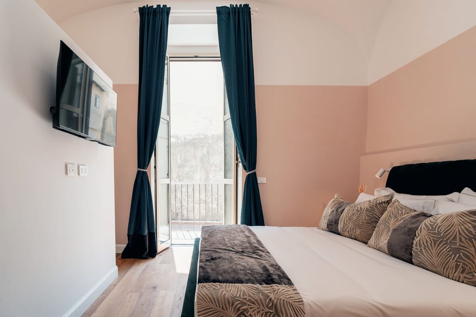 Comfort Room, Courtyard View | In-room safe, soundproofing, iron/ironing board, free WiFi