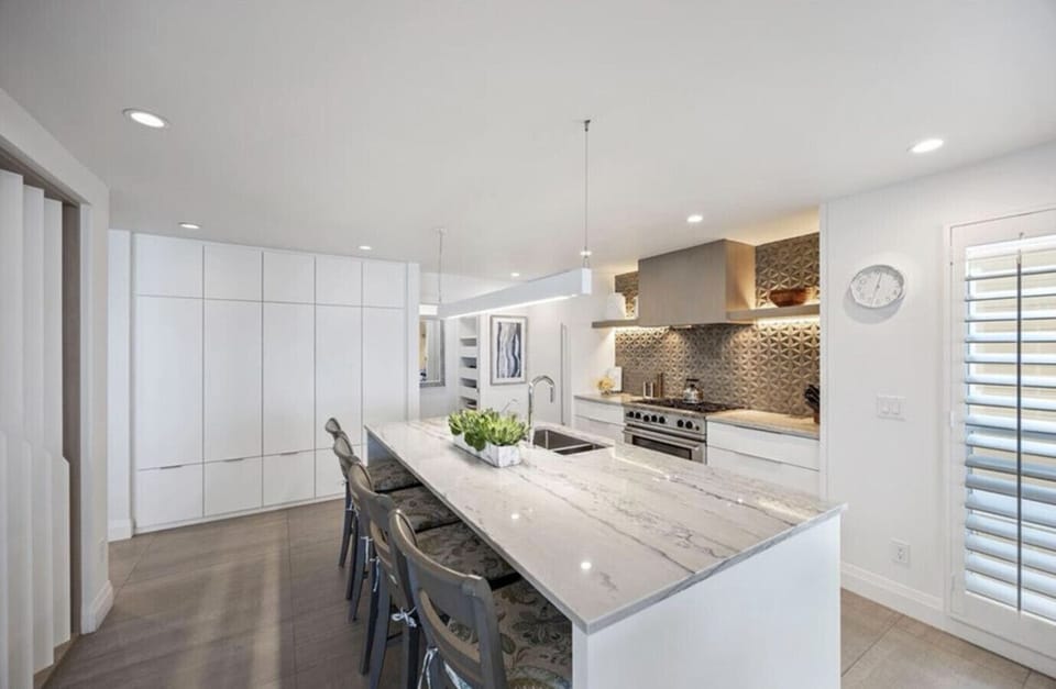 Bright modern kitchen with oversized island for group meals