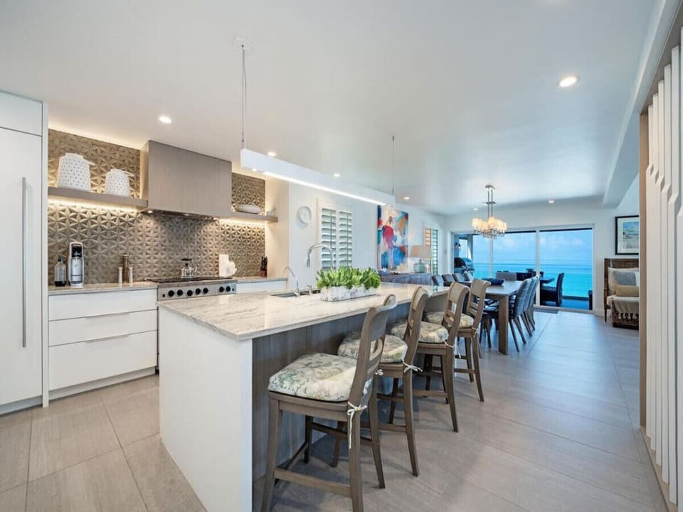 Coastal kitchen with high-end finishes and endless Gulf views