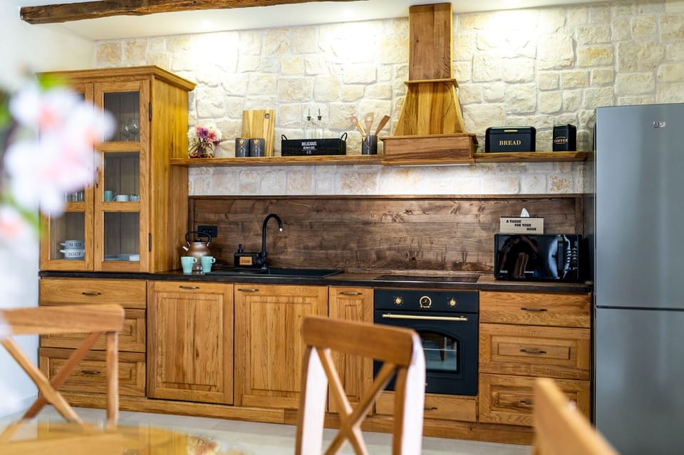 Villa | Private kitchen | Fridge, microwave, oven, stovetop