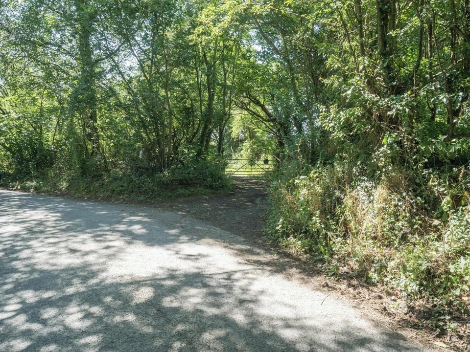 Entrance gate across lane leading to The Old Cottage