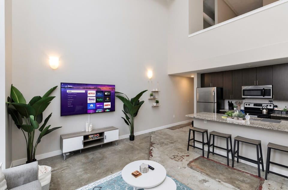 Living Area w/ 65` Roku Smart TV