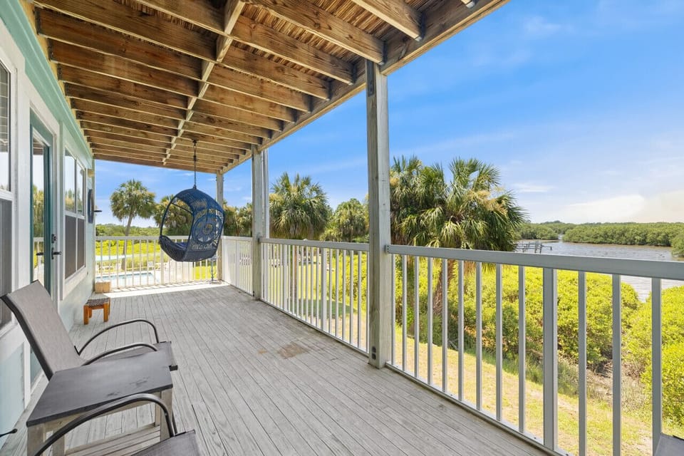 Private balcony with seating and bay views