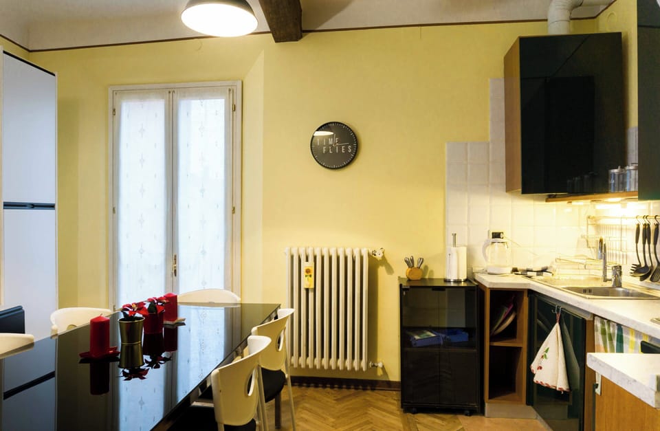 Apartment | Living area | 30-inch flat-screen TV with digital channels
