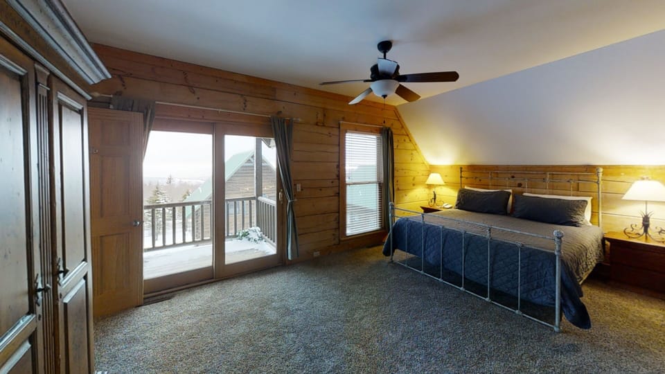 Indoors, Door, Ceiling Fan, Bed, Furniture