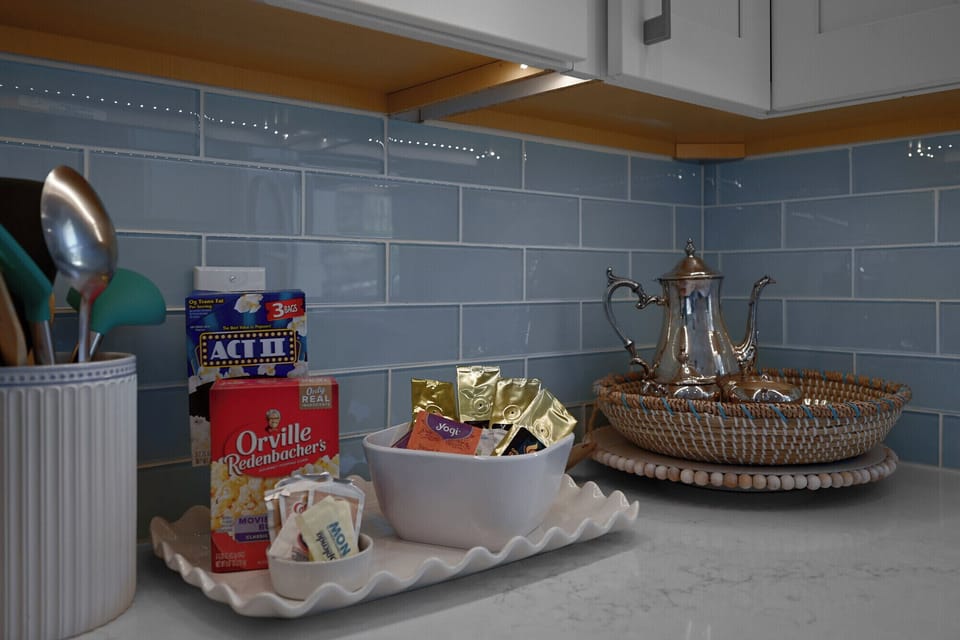 Amenities in kitchen include small pack locally roasted coffee and organic tea