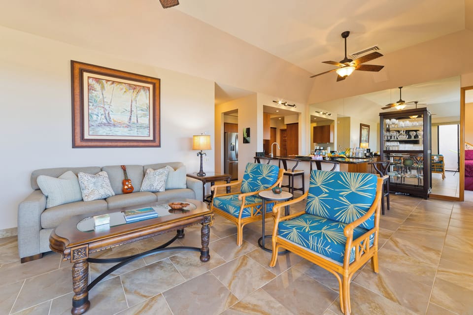 Condo | Living area | 65-inch Smart TV with digital channels, books