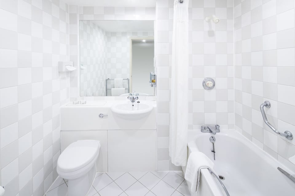 Shower, eco-friendly toiletries, hair dryer, towels