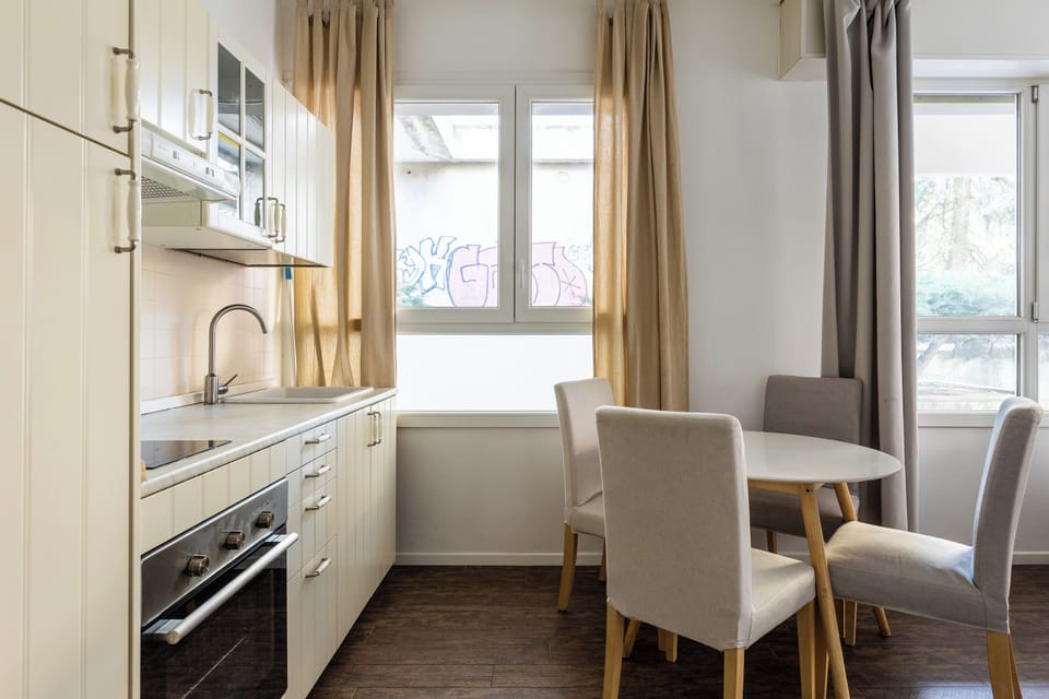 Apartment | Private kitchen | Electric kettle, dining table