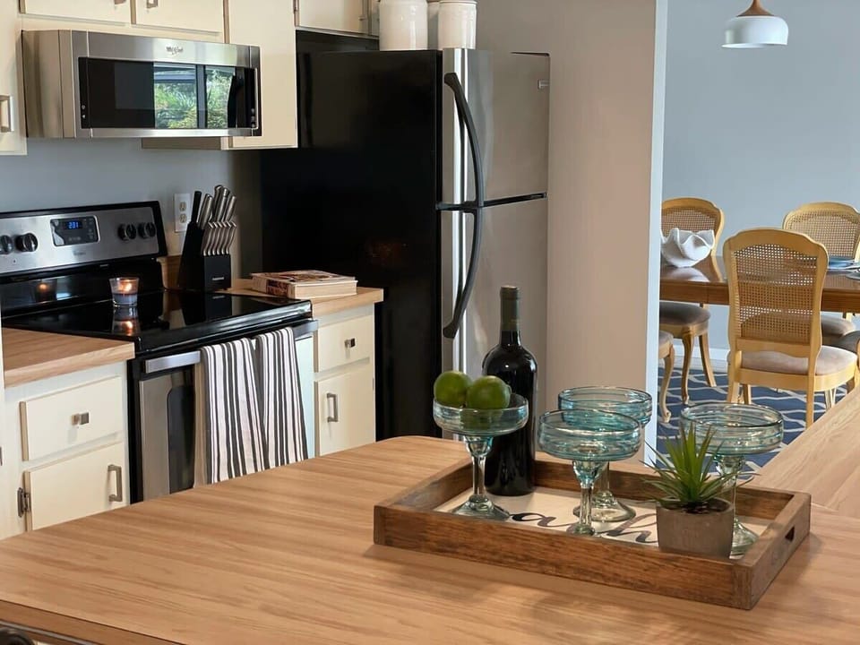 Entertain your guests in an open kitchen layout next to the game room and a window to the lanai.