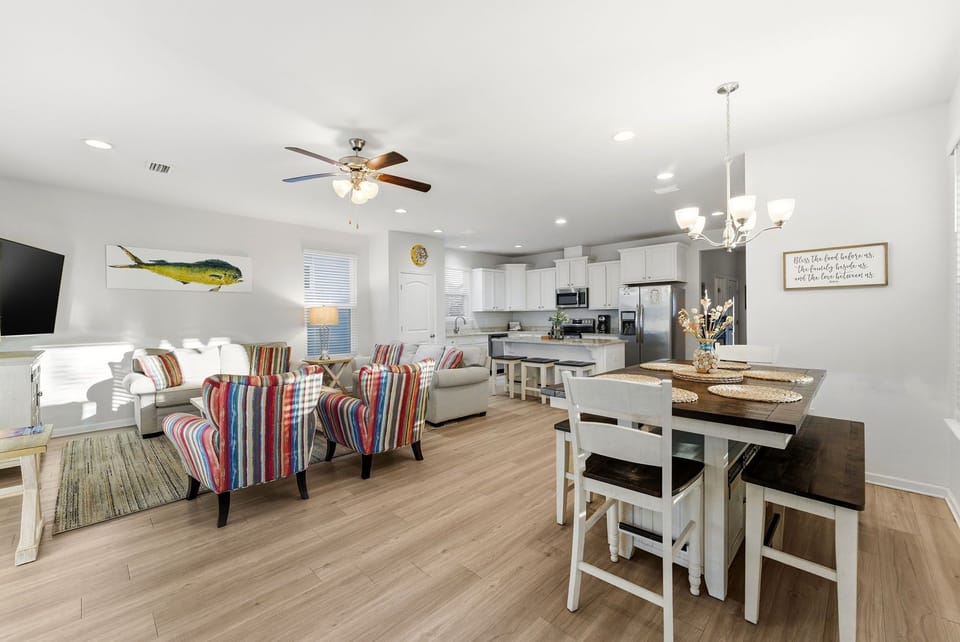 Your bright open-concept space flows seamlessly from living to dining to kitchen, perfect for gathering and creating memories together.