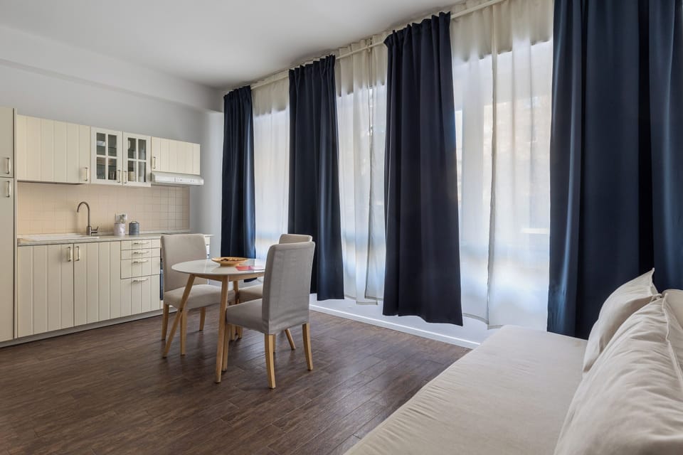 Apartment | Living area | 35-inch flat-screen TV with digital channels