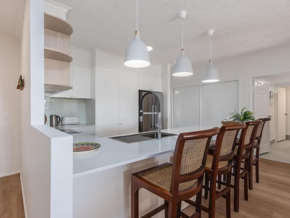 Apartment, Balcony, Beach View | Private kitchen | Electric kettle, dining table
