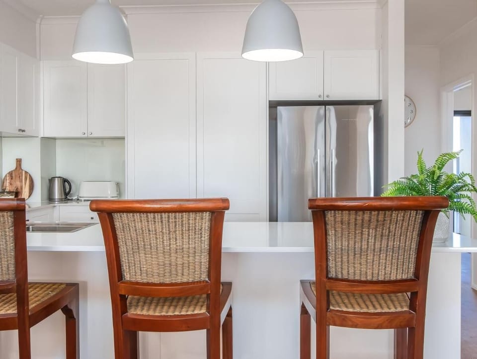 Apartment, Balcony, Beach View | Private kitchen | Electric kettle, dining table