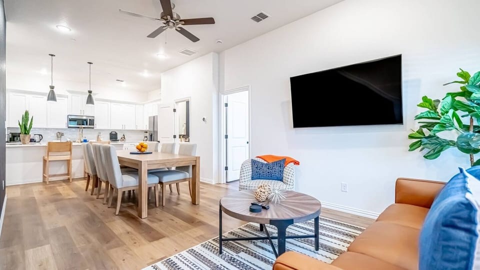 Gather around and eat like you live here. The dining area seats your whole group and flows seamlessly into the full kitchen — ideal for group travel, family stays, and anyone who wants more than a hotel room near Globe Life Field.