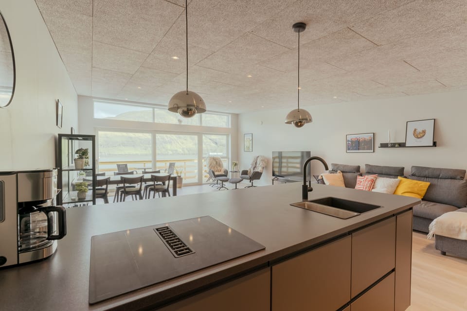 Panoramic Apartment | Private kitchen | Coffee/tea maker, full-size fridge, microwave, oven