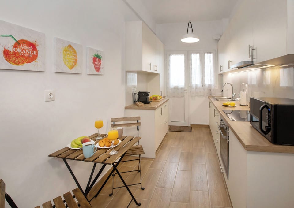 Comfort Apartment, 2 Bedrooms | Private kitchen | Full-size fridge, oven, stovetop, cookware/dishes/utensils