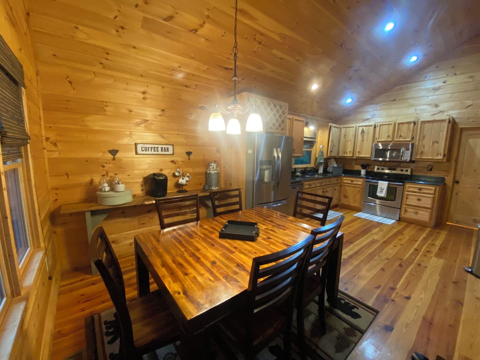 Kitchen, dining area and coffee bar