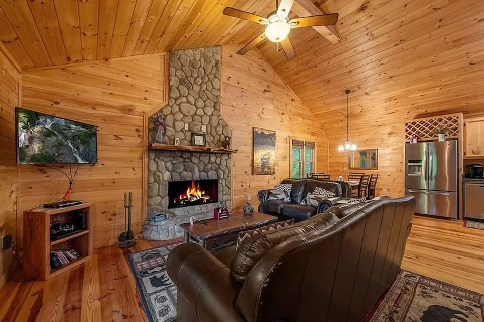 Our cozy living room with cathedral ceilings and gas fireplace 