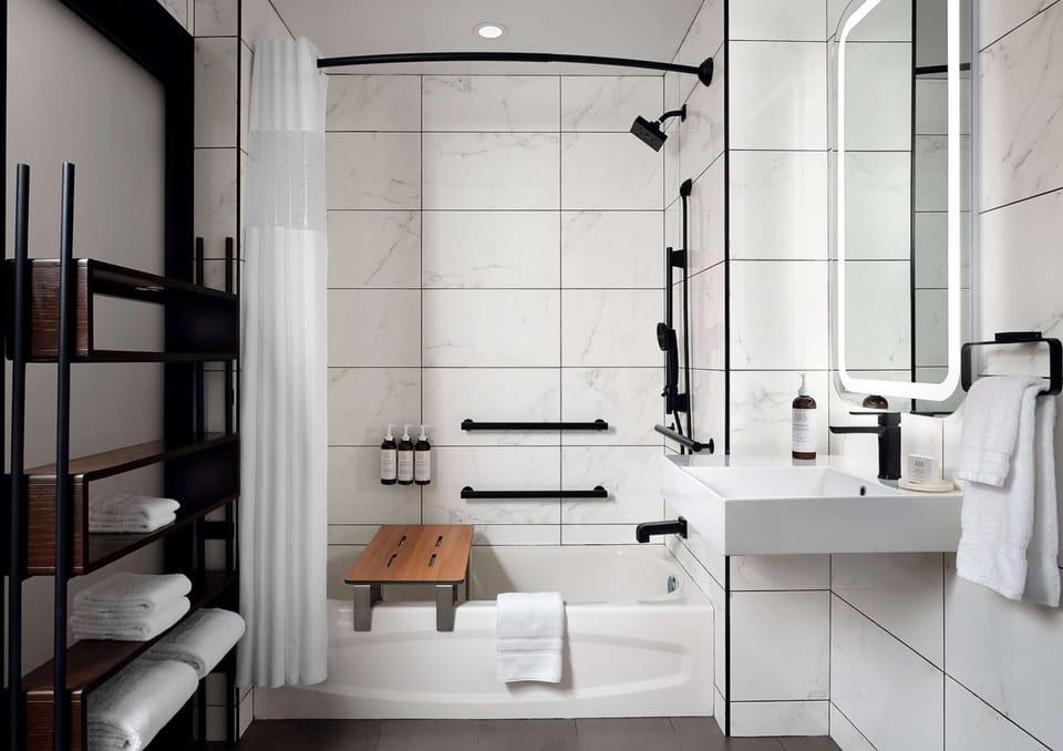 Rainfall showerhead, designer toiletries, hair dryer, bathrobes