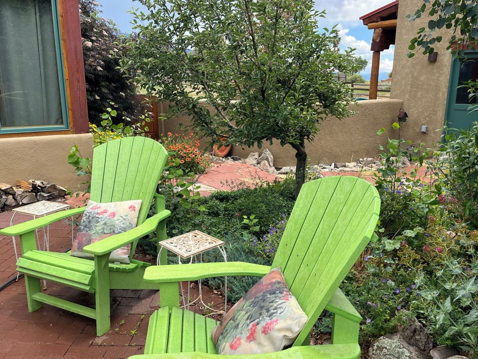 Adirondack lounge chairs in the garden courtyard.