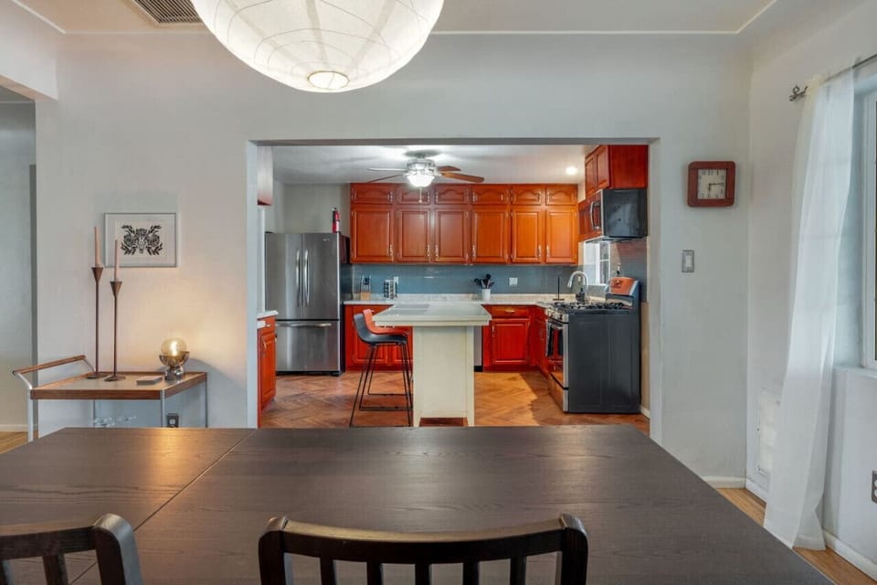 View from the dining area of the spacious kitchen, fully stocked and ready for your stay